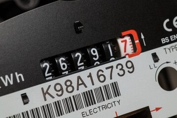 London, UK, November 24th 2025:A close-up of a domestic electric meter and counter dials. Concept for energy, heating bills, electricity, measurement and meter reading. 