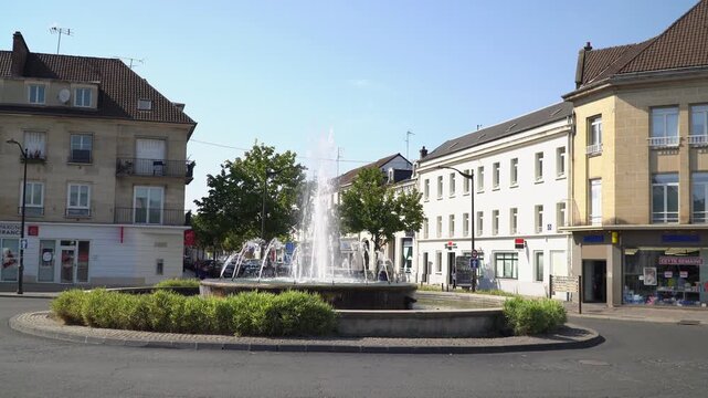 Captivating video showcases a fountain in the middle of a traffic circle in central Creil, northern France.
