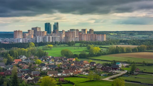 A time-lapse transition blending a modern city skyline into a peaceful rural village. This parallax motion effect symbolizes contrast, lifestyle, or urbanization.