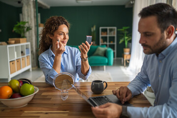 Couple multitasking morning routine while working from home