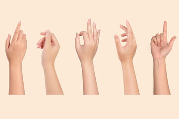 Set of Young woman hands showing on light brown background.