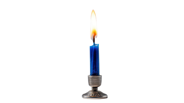 Lit blue wax candle with bright burning flame on metallic holder creating warm illumination for spiritual peaceful and decorative ambiance on white background