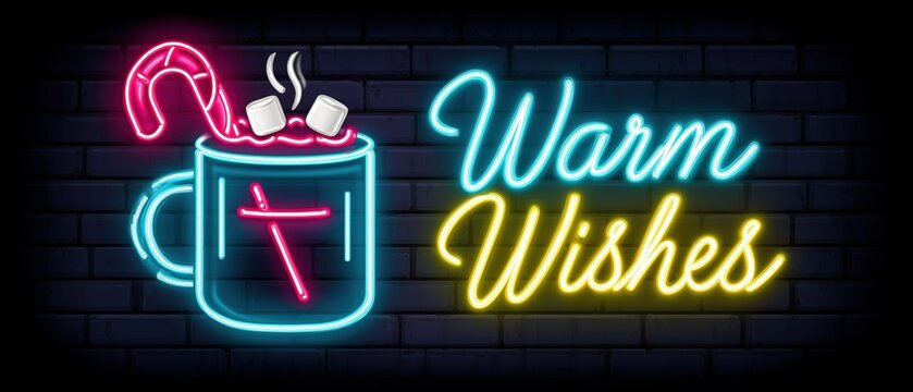 Warm Wishes Holiday Greeting Neon Sign. Glowing Hot Chocolate Mug with Marshmallows and Candy Cane on Dark Brick Wall.