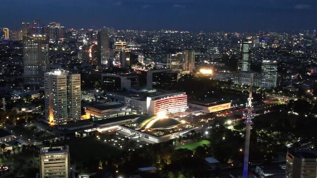 Jakarta, Indonesia-Nov 12, 2025: drone view at night of the DPR MPR building. drone view of the Indonesian People's Representative Council building (Gedung DPR)
