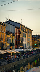 Canal in Milan, Italy, glowing in warm sunset light