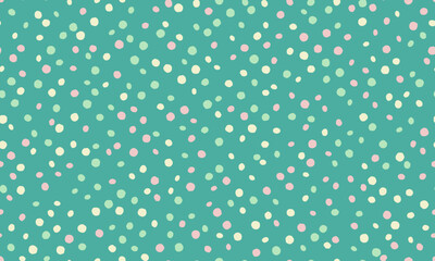 Delightful pastel dots scattered on a teal background.