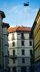 Narrow street in Milan, Italy, with historic buildings