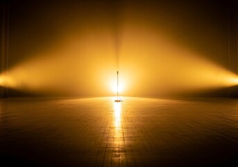 Illuminated stage bathed in golden light with a lone microphone stand spotlighted center stage