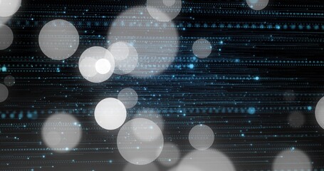 Glowing soft pale bokeh circles drifting across dark digital display with dotted blue data lines