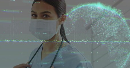 Standing nurse wearing surgical mask and scrubs, showing stethoscope and digital globe data in hall