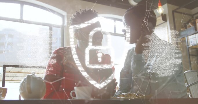 Leaning man red jacket and woman light blouse talking at cafe window, teapot padlock overlay - Powered by Adobe