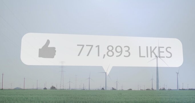 Floating speech-bubble hovering crop field, showing thumbs-up 771,893 likes, turbines