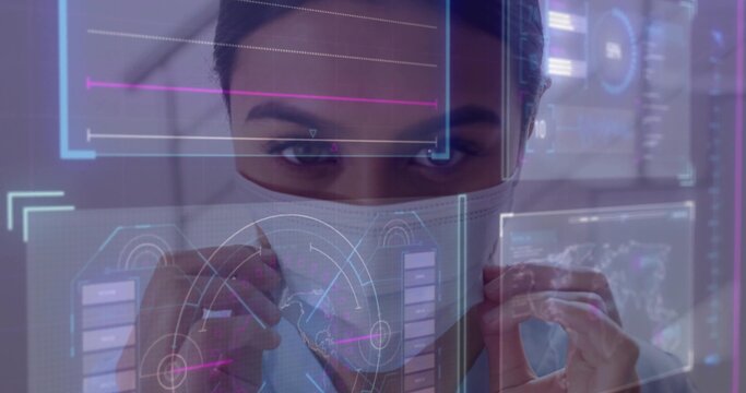 Adjusting adult female scientist holding protective face mask and using holographic HUD in lab - Powered by Adobe