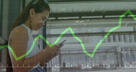 Sitting Asian woman checking smartphone at platform in white top, green chart overlay, copy space