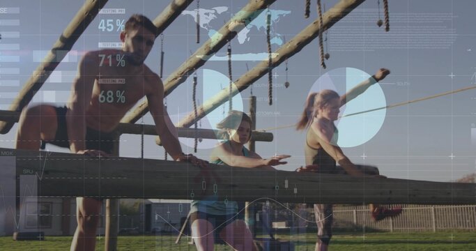 Negotiating shirtless man and women in tank tops climbing wood beams, ropes on training field, HUD - Powered by Adobe