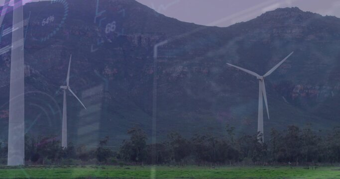 Fototapeta Standing three white turbines dominating mountain base at rural wind farm, with faint GUI overlay