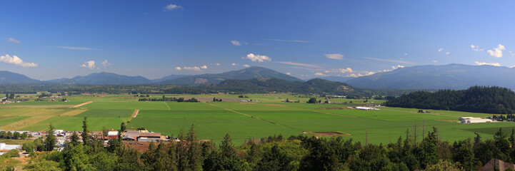 Panoramic view of scenic Skagit valley with lush green fields in the summer time. © SNEHIT PHOTO