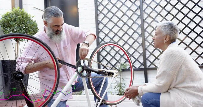 Man checking crank, woman holding wheel, grabbing wrench while animated torque arrows aiding DIY