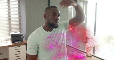 Man placing hand on head tilting right, stretching neck for health, pink particles growing at chest - Powered by Adobe