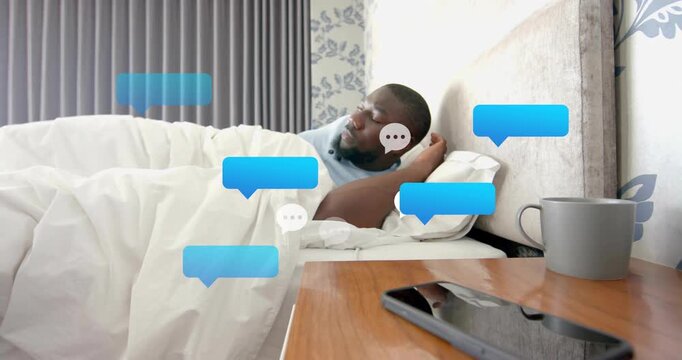 Man waking in bed, incoming blue bubbles appearing, tapping mobile tech, pulling duvet overwhelmed