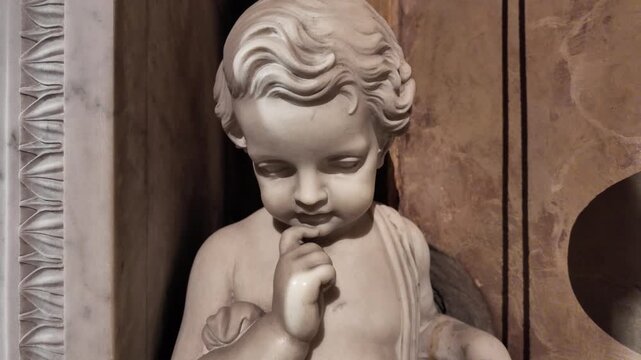 Marble statue of a child angel