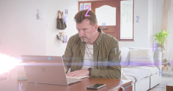 mature man typing and pausing at table, generating alphanumeric overlay while analyzing tech data