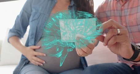 Expectant parents shifting card revealing ultrasound, hologram brain overlaying card for health