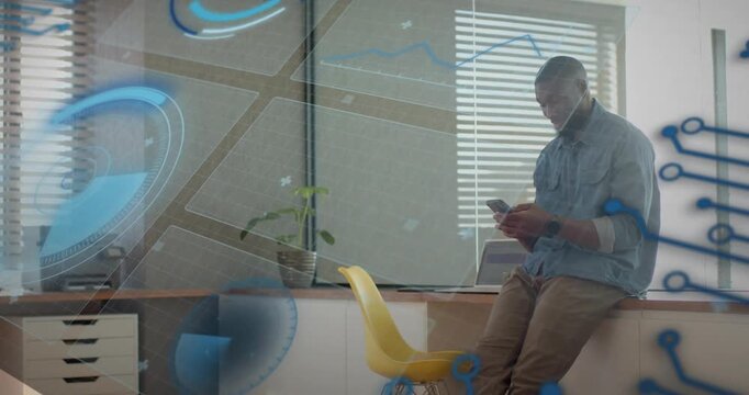 Male office worker tapping phone and scrolling on counter, testing tech AR code sweeping frame