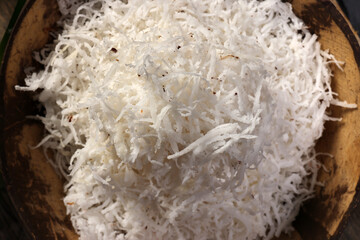 Traditional Malaysian desert Nonyah Kuih making preparing ingredients panadn leaf shredded coconut...