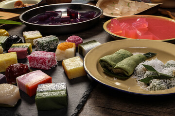 Traditional Malaysian desert Nonyah Kuih making preparing ingredients panadn leaf shredded coconut...