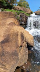 Cascading Waterfalls Over Rocks in Falls Park, Greenville, South Carolina
