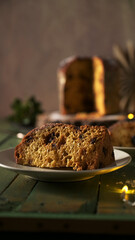Single Slice of Panettone on a Rustic Wooden Table