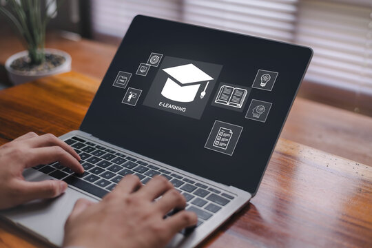 Digital e-learning platform displayed on a laptop with education icons representing online courses remote training and modern learning technology for students, professionals and corporate development.