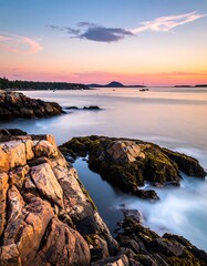 Coastal Serenity - A Rocky Shoreline at Sunset in Maine, USA.
