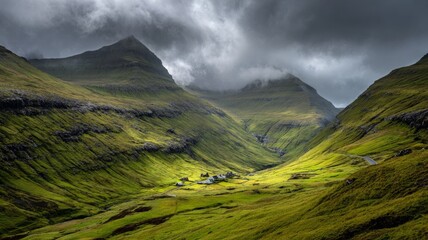 Vast green landscape with rolling hills and rugged terrain under dramatic cloudy sky in the faroe islands, showcasing serene natural beauty and untouched scenic vistas