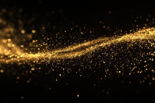Abstract Golden Glittering Trail Against Black Background with Sparkling Light Bokeh Effect
