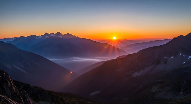 Golden sunrise paints the mountain peaks with vibrant colors and light rays - Powered by Adobe