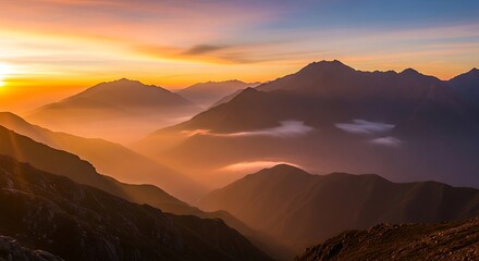 Golden hour paints the mountain range in warm hues of orange and purple