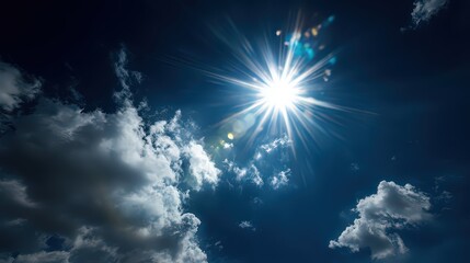 Bright Sun Shining Through Clouds in Blue Sky with Lens Flare