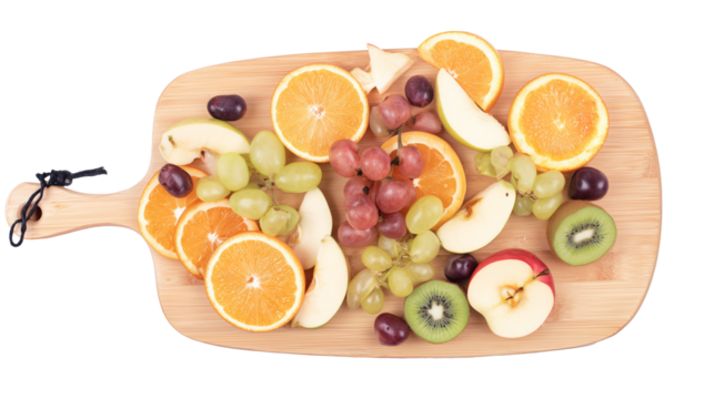 Assorted fresh fruits on a rustic wooden cutting board with transparent background