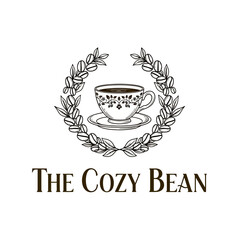 Elegant coffee cup and leaf wreath logo for The Cozy Bean.