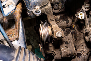 Accessory belt tensioner, the belt has already been removed.