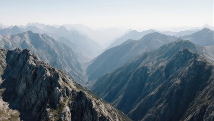 Panoramic mountain range view, hazy, distant peaks