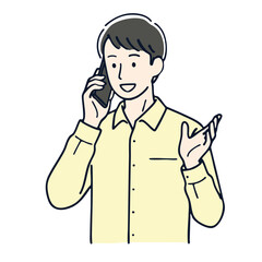 Young man talking on smartphone, smiling, wearing yellow shirt, casual communication concept