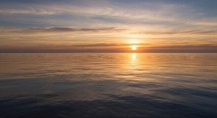 Fototapeta premium Golden sunset over a calm lake