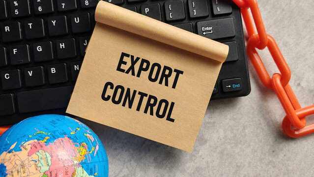 Export Control and Trade Regulation: International Commerce Restrictions Noted on Paper with Globe, Keyboard, and Chain