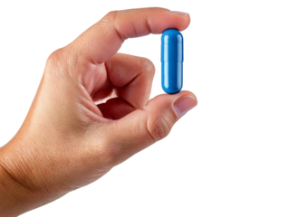 Hand holding capsule isolated on transparent or white background