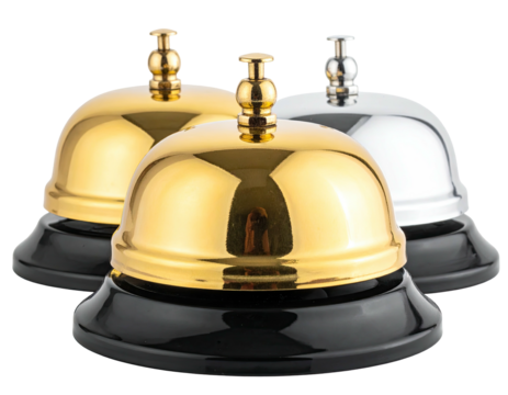 Three metallic service bells, gold, silver, and brass, on black circular bases