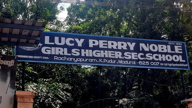 Madurai, Tamilnadu, India - November 20, 2025: Close-up view of the Lucy Perry Noble Girls Higher Secondary School name board in K. Pudur, Madurai, established in 1892