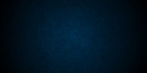 Dark Blue background with grunge backdrop texture, watercolor painted mottled blue background, colorful bright ink and watercolor textures on black paper background.